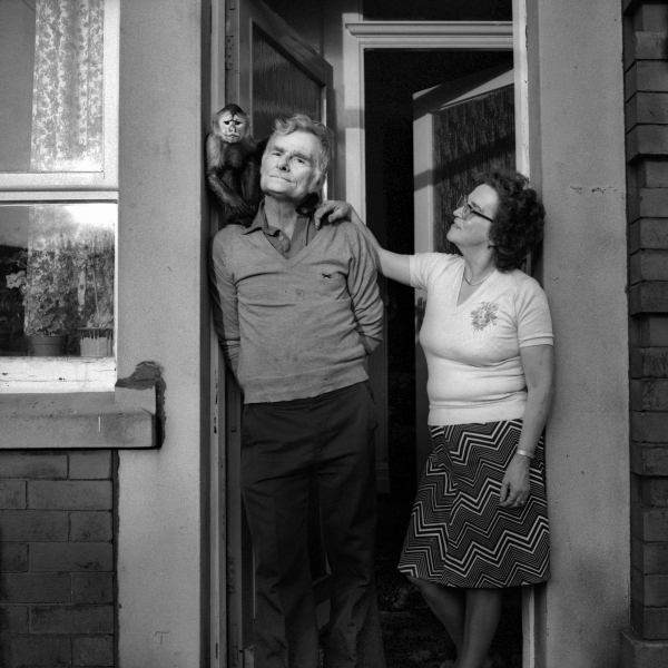 Couple with pet monkey, Blackburn