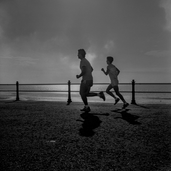 Joggers on Northern Promenade, Blackpool 1987 From British Coastal Resorts - Photographic Essay by Christopher John Ball Joggers on Northern Promenade, Blackpool 1987 From British Coastal Resorts - Photographic Essay by Christopher John Ball