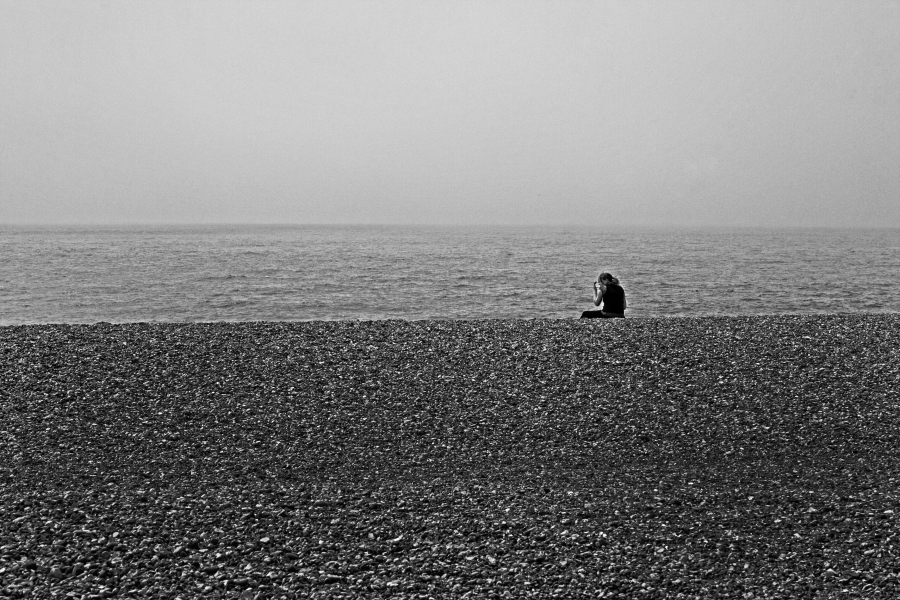 Woman on Pebble Beach, Hastings 2007 From British Coastal Resorts - Photographic Essay by Christopher John Ball Woman on Pebble Beach, Hastings 2007 From British Coastal Resorts - Photographic Essay by Christopher John Ball