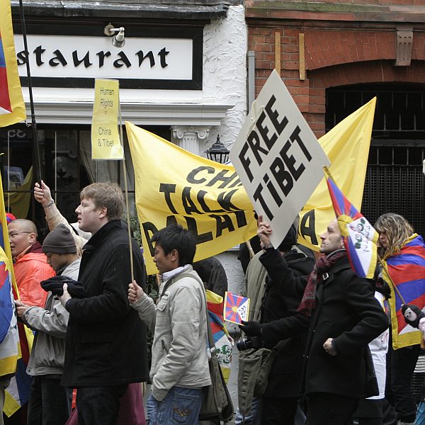 'London - A City and its People' - Olympic Torch Procession with Free Tibet Protest near Russell Square 6th April 2008 - A photographic study by Christopher John Ball - Photographer and Writer